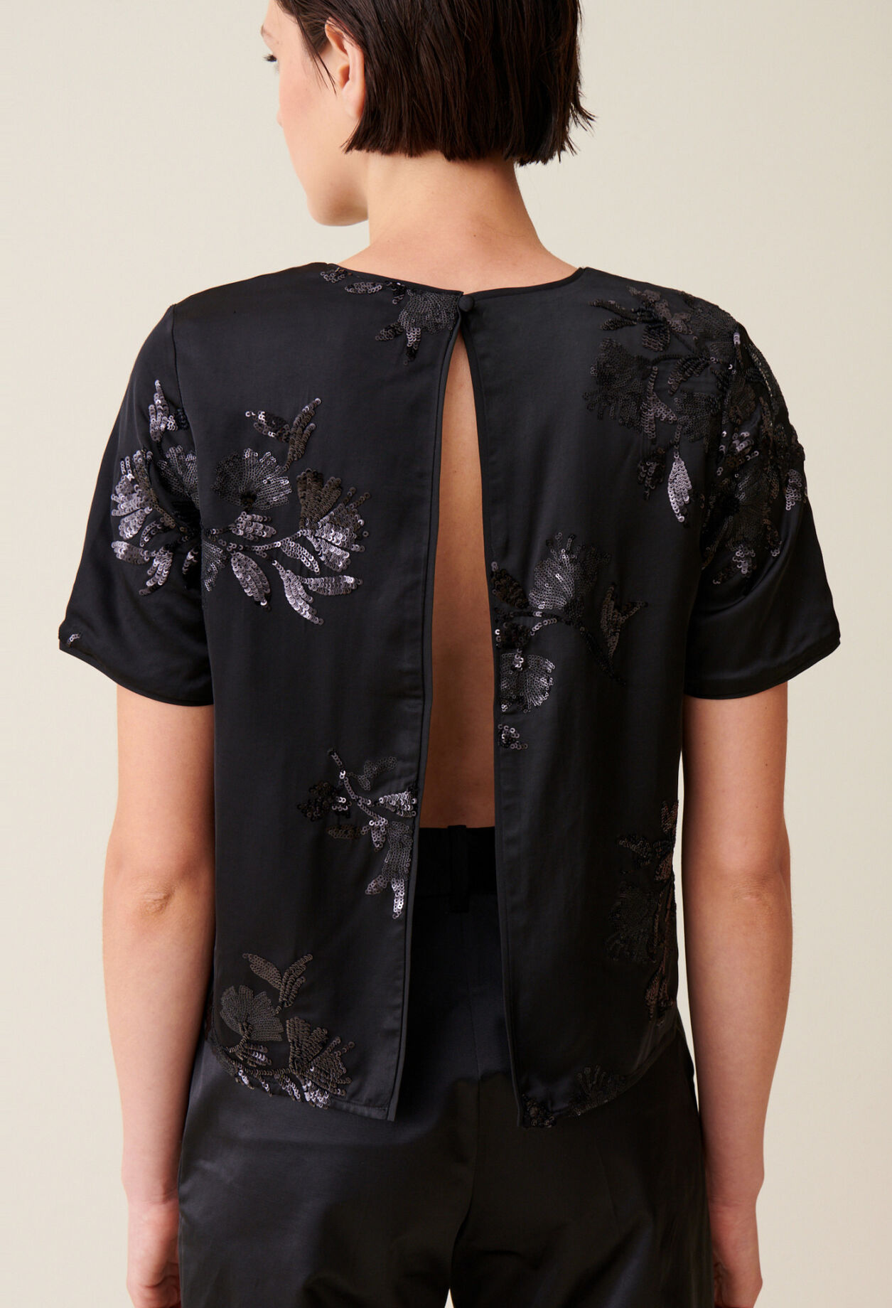 Black top with embroidered sequins