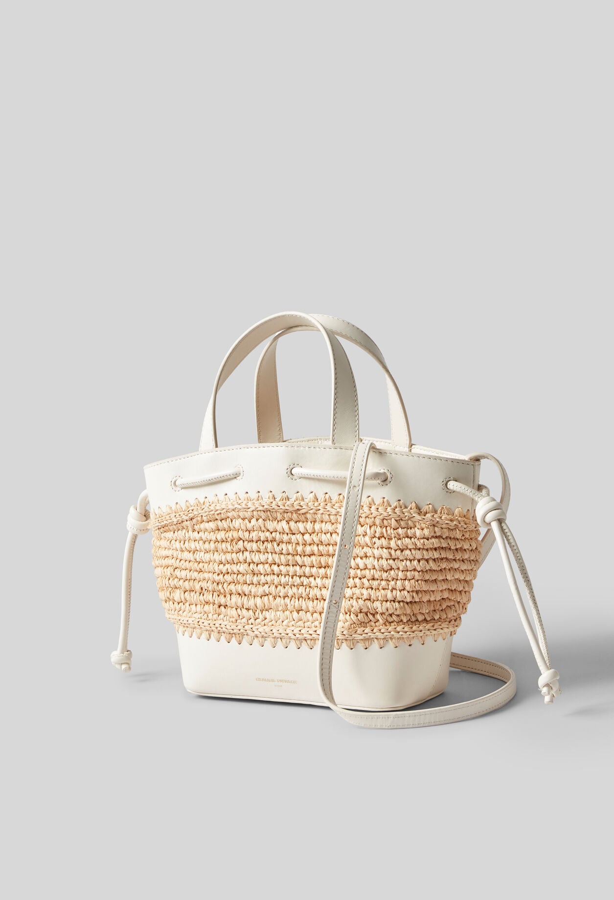 Raffia and leather basket