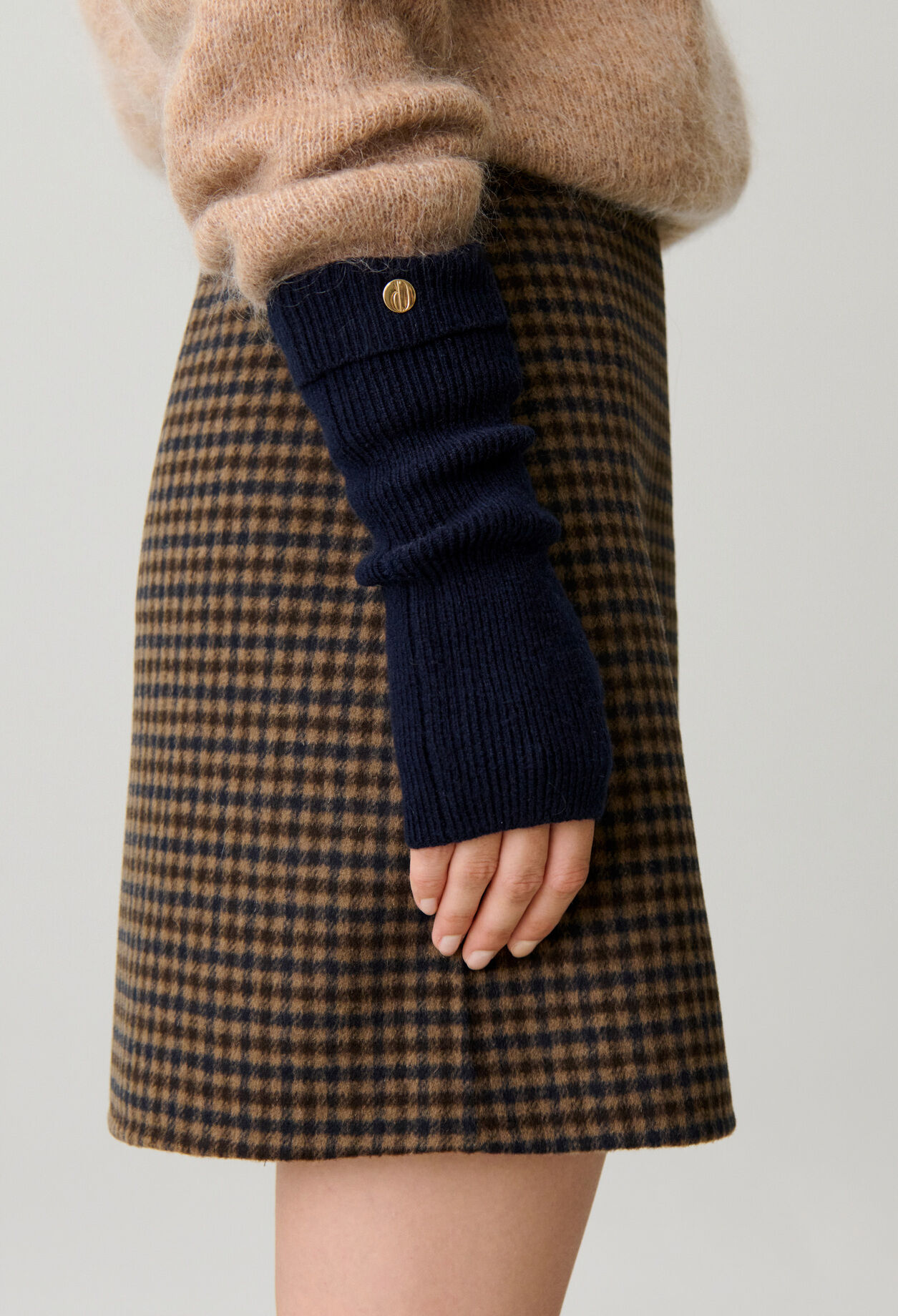 Wool mitts with gold CP rivet