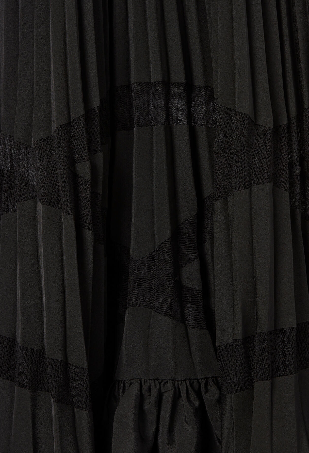 Asymmetrical pleated skirt