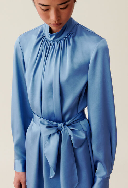 Flowing dress with black bow collar