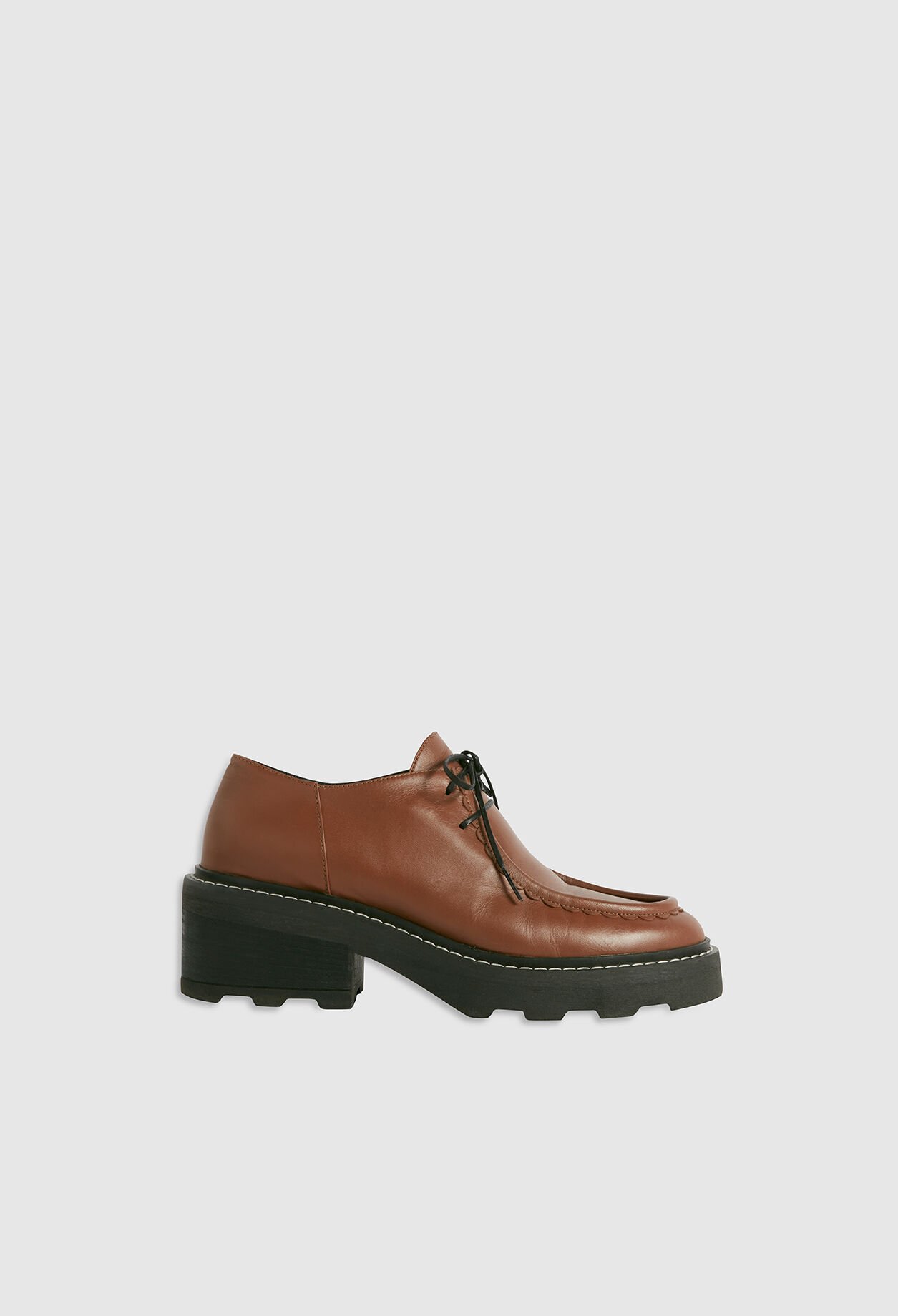 Heeled brown derbies