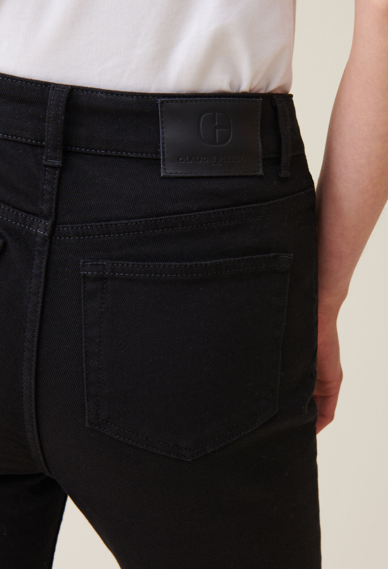 Black mid-rise slim jeans