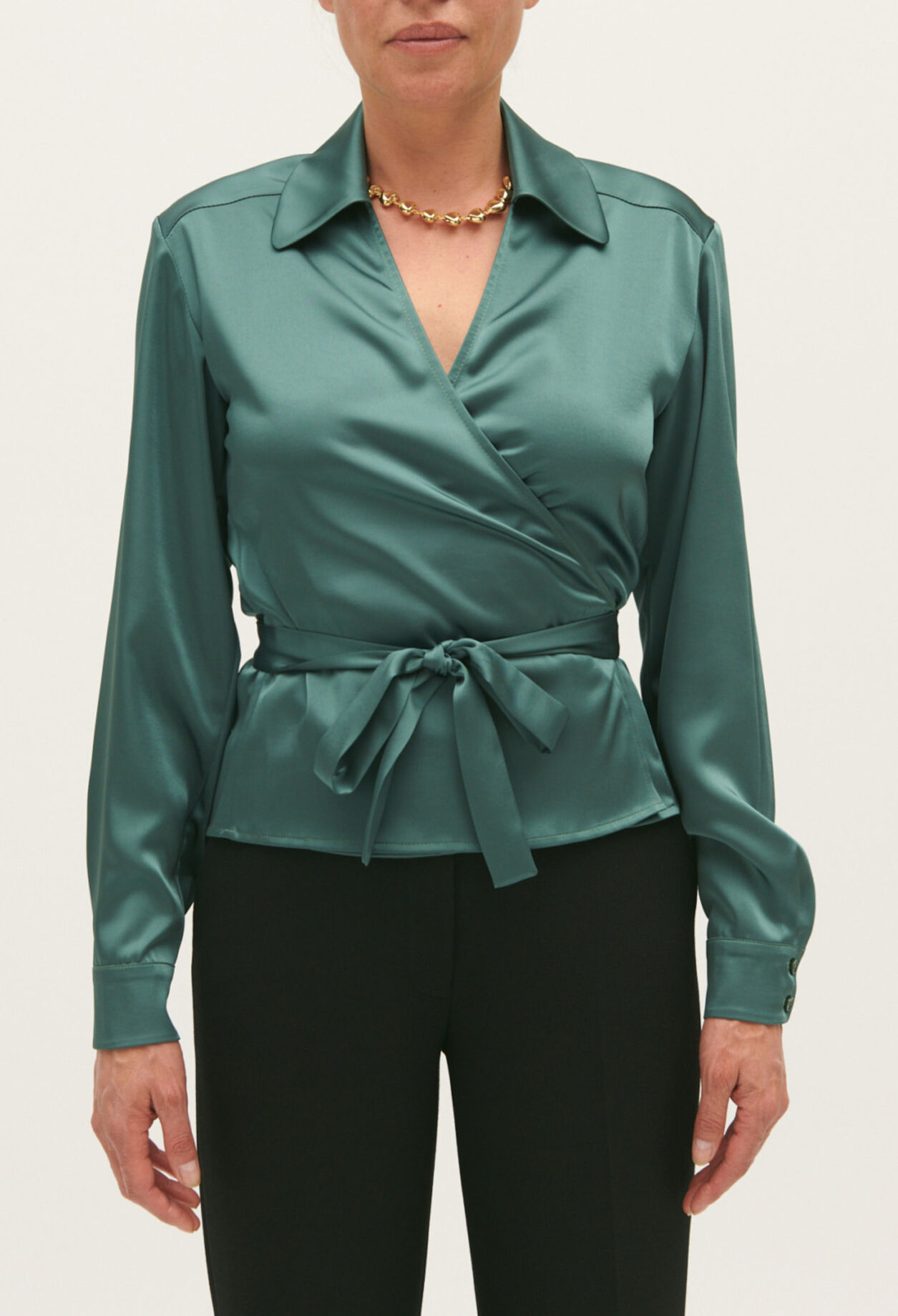 Green wrapover blouse