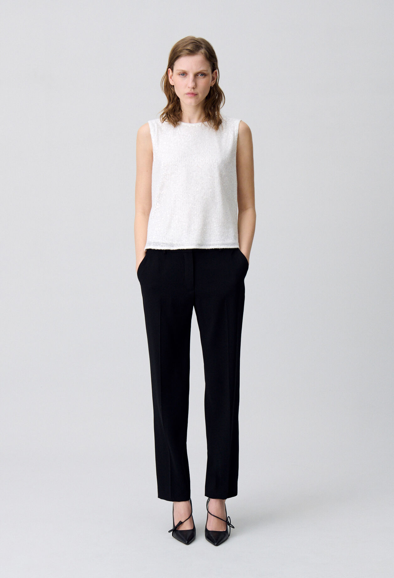 Off-white sequinned sleeveless top