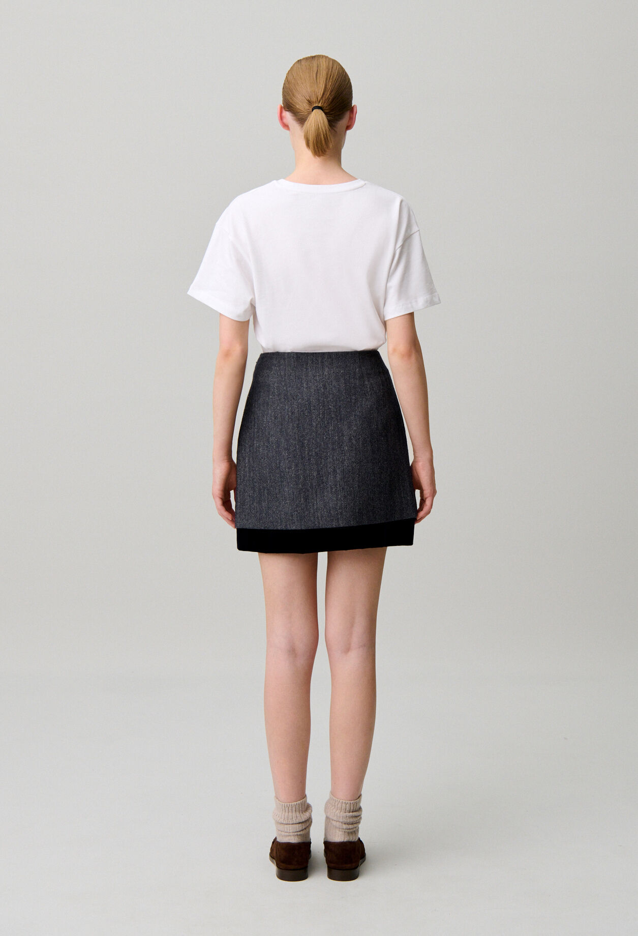 Short bi-material skirt