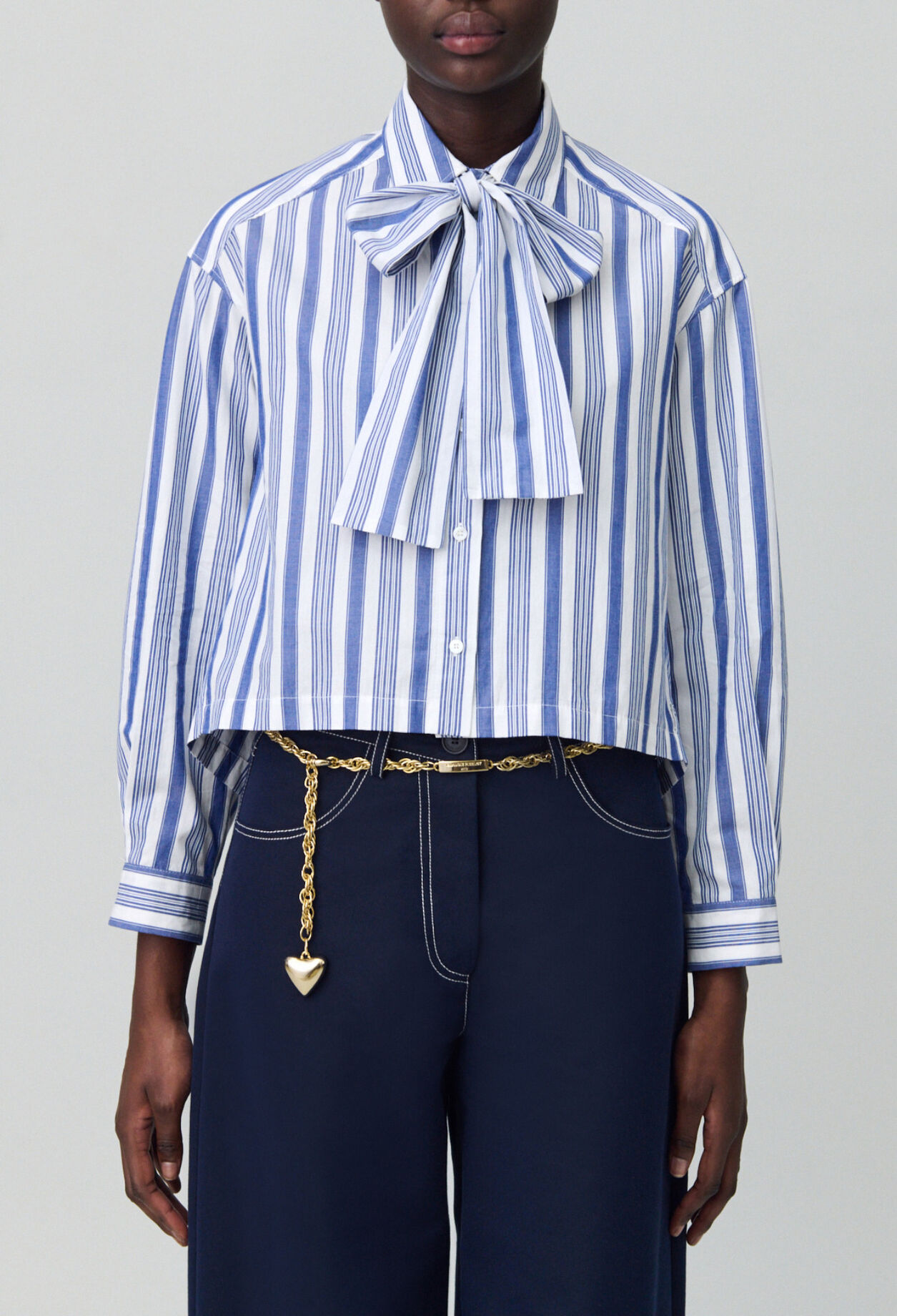 Striped shirt with bow collar