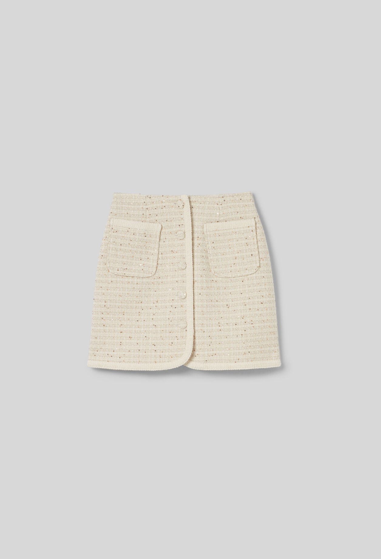 Buttoned tweed mini skirt