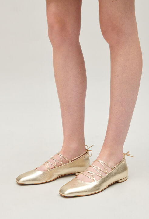 Gold leather ballet pumps